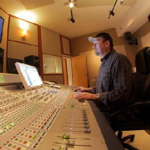 J.C. Richardson behind his Pro Tools console with an X-keys Stick